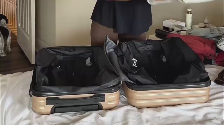 2PackBag compressing a suitcase